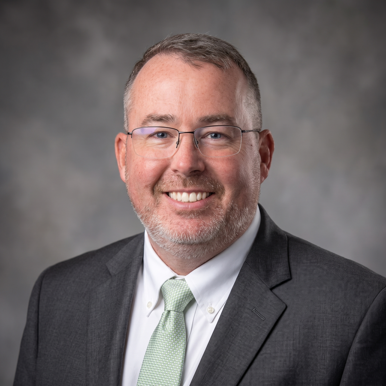 Portrait of owner Chris Jackson, retired Wake County Sheriff's deputy